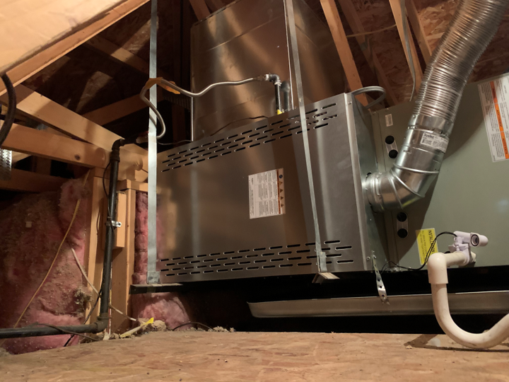 Gas furnace installed in a Phoenix attic with flexible ductwork
