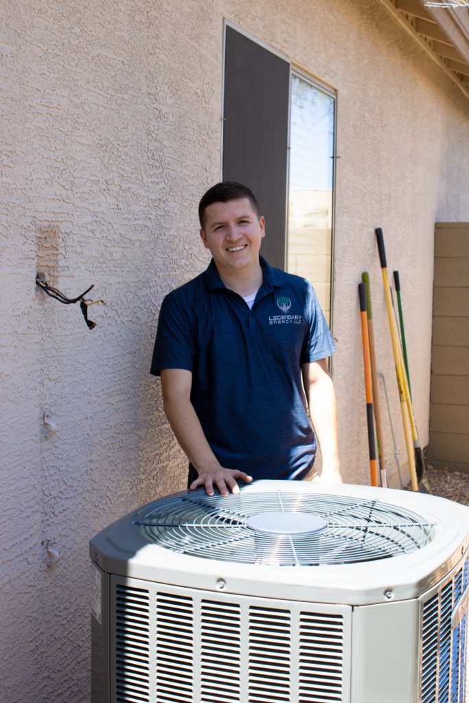 Smiling Legendary Energy technician at a Phoenix home