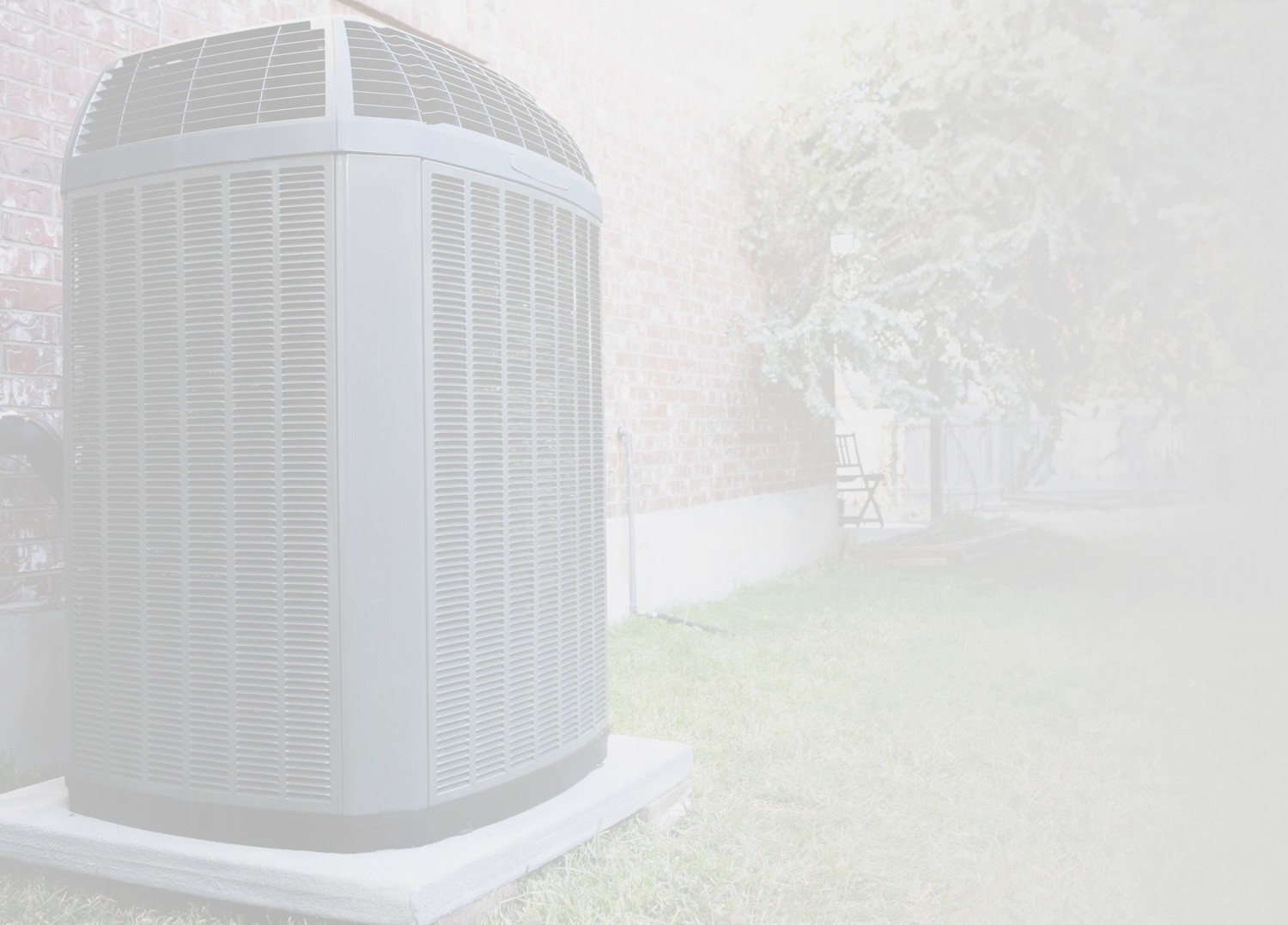 ac unit 21 Residential air conditioning condenser unit installed outside a brick home
