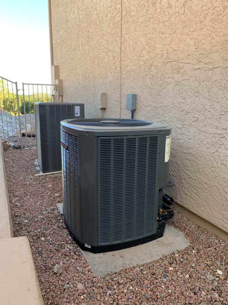 New AC condenser fitted into a narrow side yard