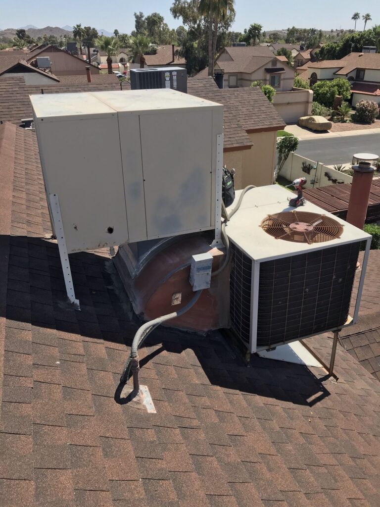 Old rooftop AC equipment before replacement
